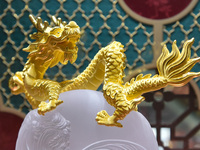 Gold ornaments are on display at a gold shop in Nanjing, Jiangsu province, China, on March 9, 2024. (