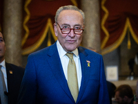 Senate Majority Leader Chuck Schumer (D-NY) walks to the House chamber with his colleagues to hear President Joe Biden delivers the annual S...