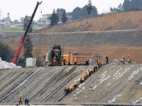 Workers are working at the construction site of the Jinsha-Tongzi Expressway (Renhuai section) in Zunyi, China, on March 10, 2024. (