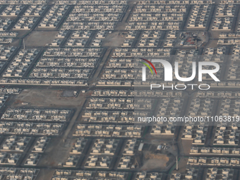 An aerial view of houses in Abu Dhabi, United Arab Emirates on February 28, 2024. (