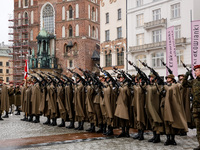 Polish soldiers shoot a salve as they celebrate the 25. anniversary of Poland joining North Atlantic alliance in the Main Square in Old Town...