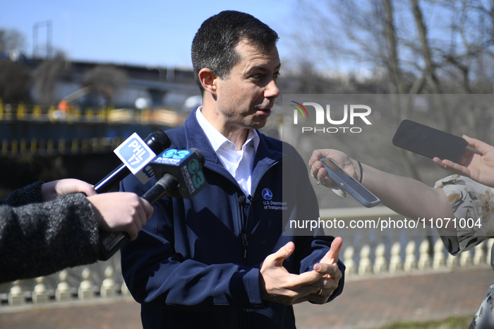 U.S. Secretary of Transportation Pete Buttigieg is speaking to reporters about infrastructure investments following a tour of the reconstruc...