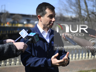 U.S. Secretary of Transportation Pete Buttigieg is speaking to reporters about infrastructure investments following a tour of the reconstruc...