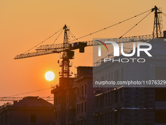 A commercial housing complex is under construction in Qingzhou, China, on March 15, 2024. (