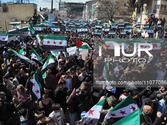 Syrians mark the 13th anniversary of the uprising against the Bashar al-Assad regime in the rebel-held city of Azaz, northwestern Syria, Mar...