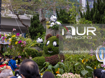 Visitors are enjoying the 2024 Hong Kong Flower Show in Hong Kong, S.A.R., on March 16, 2024. (