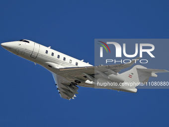 A Bombardier Challenger 350 from Avcon Jet is taking off from Barcelona Airport in Barcelona, Spain, on February 29, 2024. (