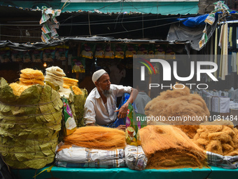 A person is selling simai (sweet food items) during Ramadan in Kolkata, India, on March 17, 2023. (