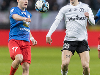 Arkadiusz Pyrka and Mark Gual are playing during the Legia Warsaw vs Piast Gliwice PKO Ekstraklasa match in Warsaw, Poland, on March 17, 202...