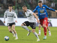 Mark Gual and Rafal Augustyniak are playing during the Legia Warsaw vs Piast Gliwice PKO Ekstraklasa match in Warsaw, Poland, on March 17, 2...