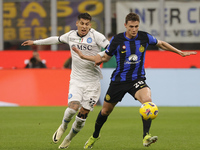 Benjamin Pavard of Inter FC and Mathias Olivera of SSC Napoli are playing during the Serie A soccer match between Inter FC and SSC Napoli at...