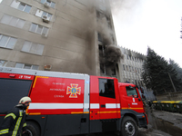 A fire truck is at the site of a missile attack by Russian troops on a private enterprise in Kharkiv, northeastern Ukraine, on March 20, 202...