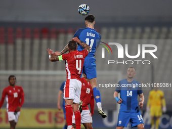 Benjamin Sesko of Slovenia is in action during the friendly international soccer match between Malta and Slovenia at the National Stadium in...