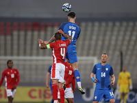 Benjamin Sesko of Slovenia is in action during the friendly international soccer match between Malta and Slovenia at the National Stadium in...