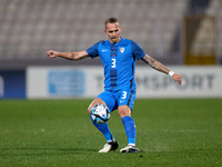 Slovenia national soccer team player Jure Balkovec is in action during the friendly international soccer match between Malta and Slovenia at...