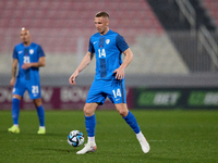 Slovenia national soccer team player Jasmin Kurtic is in action during the friendly international soccer match between Malta and Slovenia at...