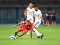 Oday Kharoub of Palestine is in action against Jamal Bhuyan of Bangladesh during the FIFA World Cup 2026 and the AFC Asian Cup Saudi Arabia...