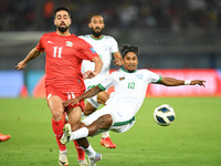 Oday Dabbagh (L) of Palestine is in action against Bishwanath Ghosh of Bangladesh during the FIFA World Cup 2026 and the AFC Asian Cup Saudi...