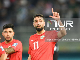 Oday Dabbagh (R) of Palestine is celebrating after scoring a goal against Bangladesh during the FIFA World Cup 2026 and the AFC Asian Cup Sa...