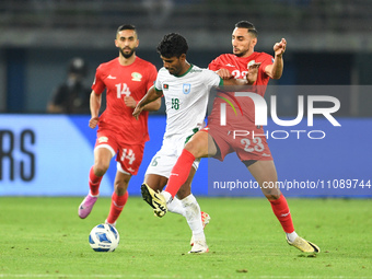 Mahmoud Eid (R) of Palestine is in action against Isa Faysal of Bangladesh during the FIFA World Cup 2026 and the AFC Asian Cup Saudi Arabia...
