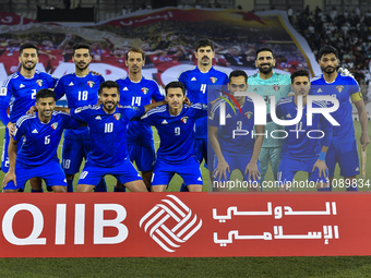 The Kuwait team is posing for a team photo before the Qualification Round for the FIFA World Cup 2026 and AFC Asian Cup 2027 Group A match b...