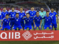 The Kuwait team is posing for a team photo before the Qualification Round for the FIFA World Cup 2026 and AFC Asian Cup 2027 Group A match b...