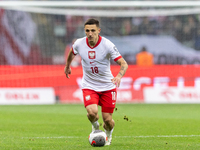 Bartosz Slisz is playing during the UEFA EURO 2024 qualifier play-off between Poland and Estonia in Warsaw, Poland, on March 21, 2024. (