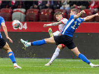 Nicola Zalewski and Maksim Paskotsi are playing in the UEFA EURO 2024 qualifier play-off between Poland and Estonia in Warsaw, Poland, on Ma...