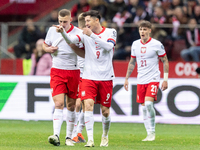 Jakub Piotrowski and Robert Lewandowski are playing in the UEFA EURO 2024 qualifier play-off between Poland and Estonia in Warsaw, Poland, o...