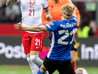 Nicola Zalewski and Kevor Palumets are playing in the UEFA EURO 2024 qualifier play-off between Poland and Estonia in Warsaw, Poland, on Mar...