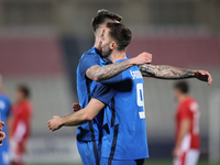 Andraz Sporar (R) of Slovenia is reacting after scoring the 0-1 goal during the friendly international soccer match between Malta and Sloven...