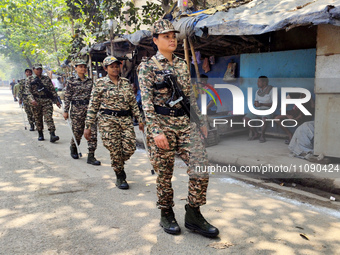 Central Reserve Police Force (CRPF) women personnel are conducting a route march in Kolkata, India, on March 22, 2024, ahead of the 2024 Lok...