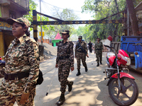 Central Reserve Police Force (CRPF) women personnel are conducting a route march in Kolkata, India, on March 22, 2024, ahead of the 2024 Lok...