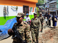 Central Reserve Police Force (CRPF) personnel are conducting a route march in Kolkata, India, on March 22, 2024, ahead of the 2024 Lok Sabha...