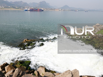 Purified water from the sewage treatment plant is meeting the standards and is being discharged into the Yangtze River in Yichang, Hubei, Ch...