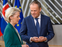 European Commission President Ursula von der Leyen (L) and Poland's Prime Minister Donald Tusk are seen talking during the second day of the...