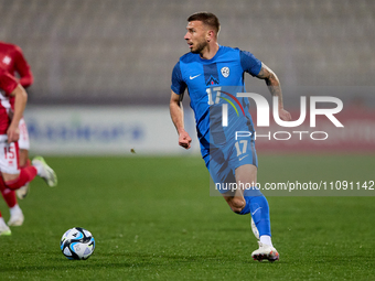 Slovenian national soccer team player Jan Mlakar is in action during the friendly international soccer match between Malta and Slovenia at t...