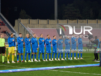 The Slovenia national soccer team players are standing for their country's national anthem ahead of the friendly international soccer match...