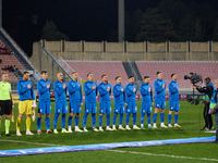 The Slovenia national soccer team players are standing for their country's national anthem ahead of the friendly international soccer match...