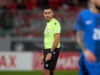 Referee Lars Hummelgaard is reacting during the friendly international soccer match between Malta and Slovenia at the National Stadium in Ta...