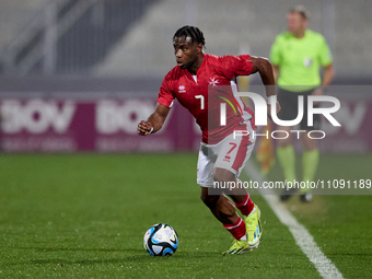 Joseph Mbong of the Malta national soccer team is in action during the friendly international soccer match between Malta and Slovenia at the...
