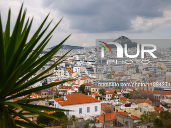 A view on Athens and Mount Lycabettus seen from Plaka neighborhood in Athens, Greece on March 16th, 2024.  (