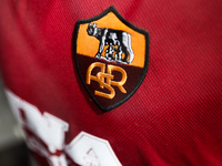AS Roma logo is seen on a football jersey at a shop in Rome, Italy on March 24, 2024. (