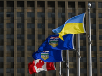 EDMONTON, CANADA - MARCH 24:
Alberta, Canadian and Ukrainian flags seen outside the Alberta Legislature building in Edmonton downtown, on Ma...