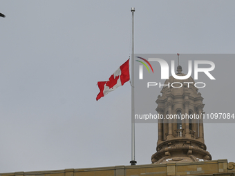 EDMONTON, CANADA - MARCH 23:
The national, provincial, and university flags, including the Canadian flag at the Alberta Legislature building...
