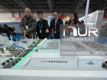 Visitors are attending the 2024 Beijing International Hydrogen Energy Technology and Equipment Exhibition at the China International Exhibit...