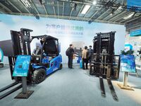 Visitors are viewing a ''solid state hydrogen storage fuel cell forklift truck'' at the 2024 Beijing International Hydrogen Technology and E...