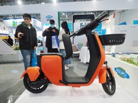 Visitors are viewing a ''hydrogen-powered two-wheeler'' at the 2024 Beijing International Hydrogen Technology and Equipment Exhibition at th...