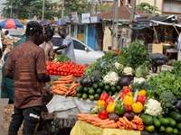 Vegetable sellers are waiting for buyers as most raw food vendors are recording low sales during the Ramadan period in Ogba, Lagos, Nigeria,...