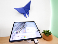 Samsung is showcasing the Galaxy Z Fold5, a vertically folding smartphone, with Google's AI on Androids Avenue at the Mobile World Congress...